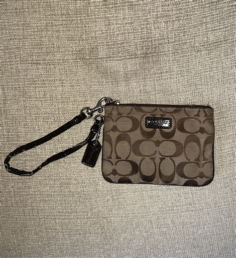 discontinued coach wristlets.